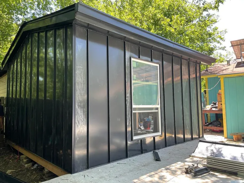 Black standing seam metal wall panels for Metal Roof Installation in Huntington